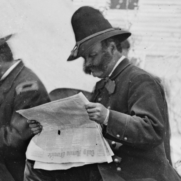 Closeup from LC-B811-2433 of General Burnside reading the Saturday, June 11th, 1864 issue of the Daily Morning Chronicle